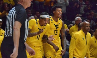 WVU Basketball Bench - Amani Hansberry and Jonathan Powell