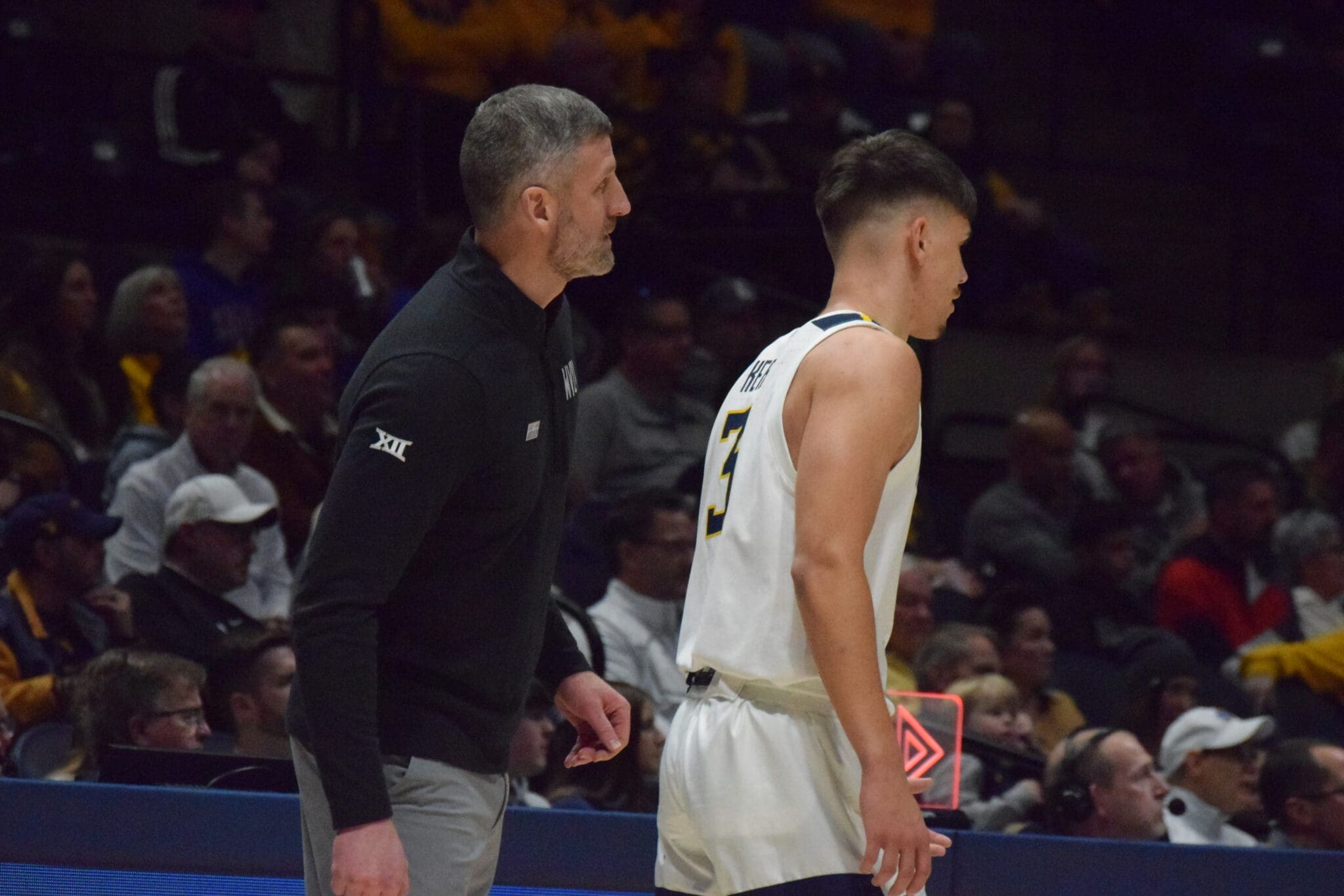 WVU Interim HC Josh Eilert and Kerr Kriisa