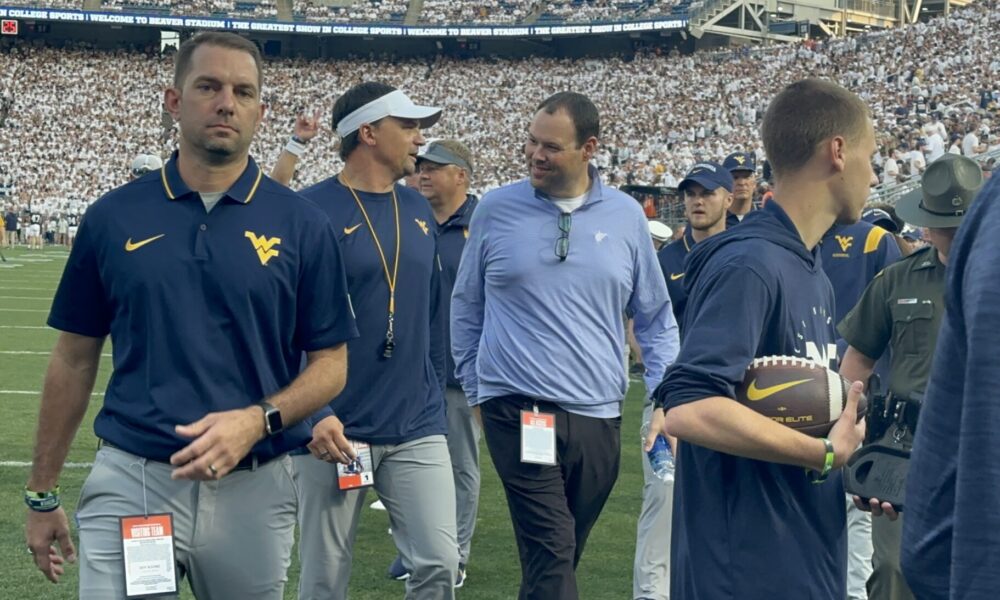 WVU Football HC Neal Brown and WVU AD Wren Baker