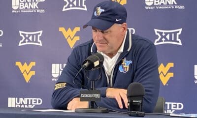 WVU Football HC Rich Rodriguez sad
