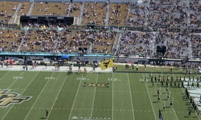 WVU flag on field at UCF