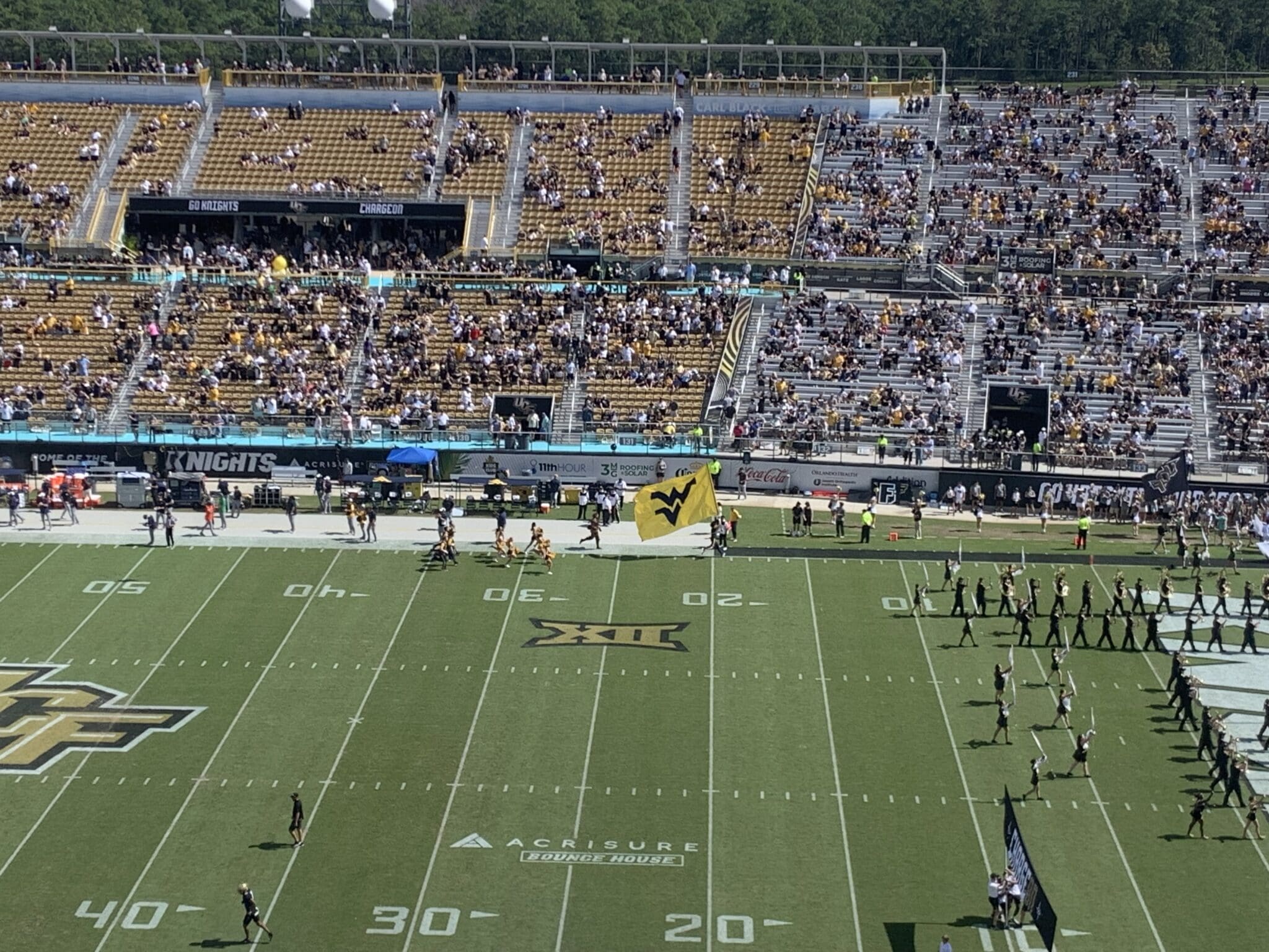 WVU flag on field at UCF