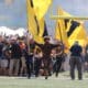 Mountaineer Mascot runs on field before WVU Football game stock