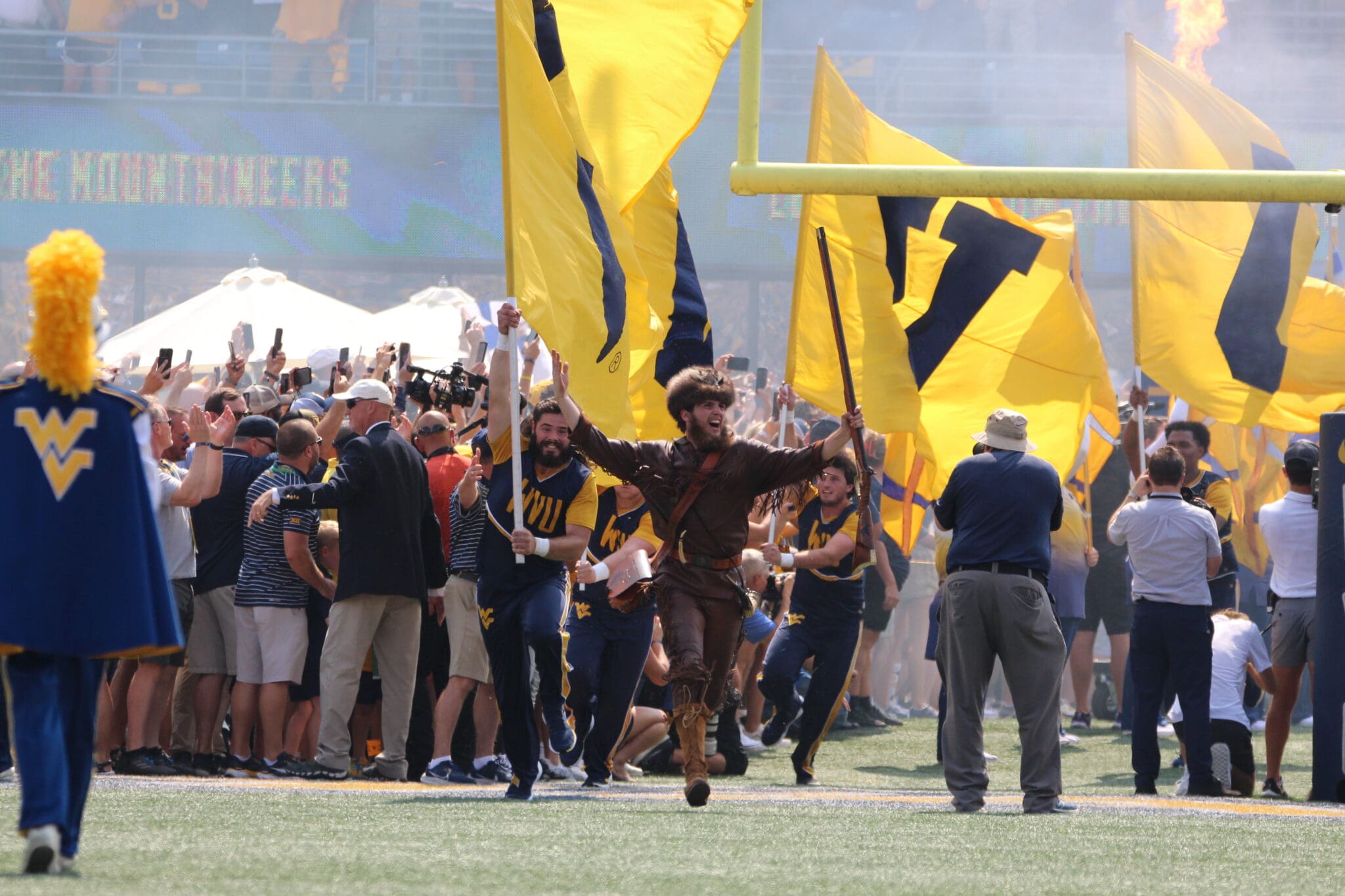 Mountaineer Mascot runs on field before WVU Football game stock