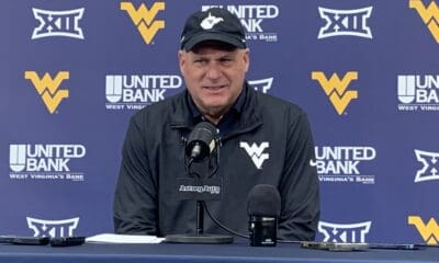 WVU Football HC Rich Rodriguez in Coal Rush gear