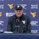 WVU Football HC Rich Rodriguez in Coal Rush gear