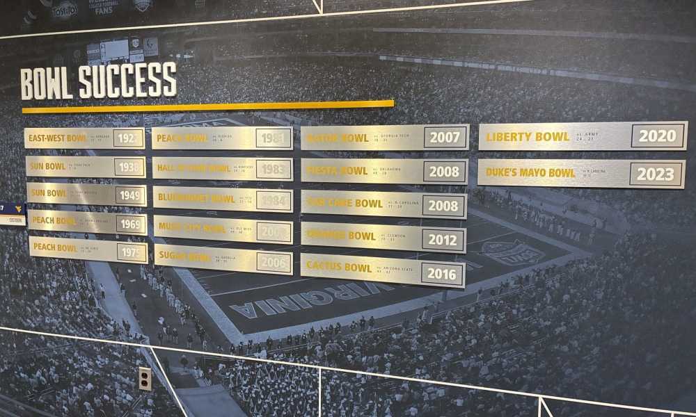 WVU Football bowl success on wall