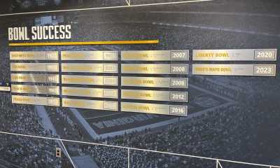 WVU Football bowl success on wall