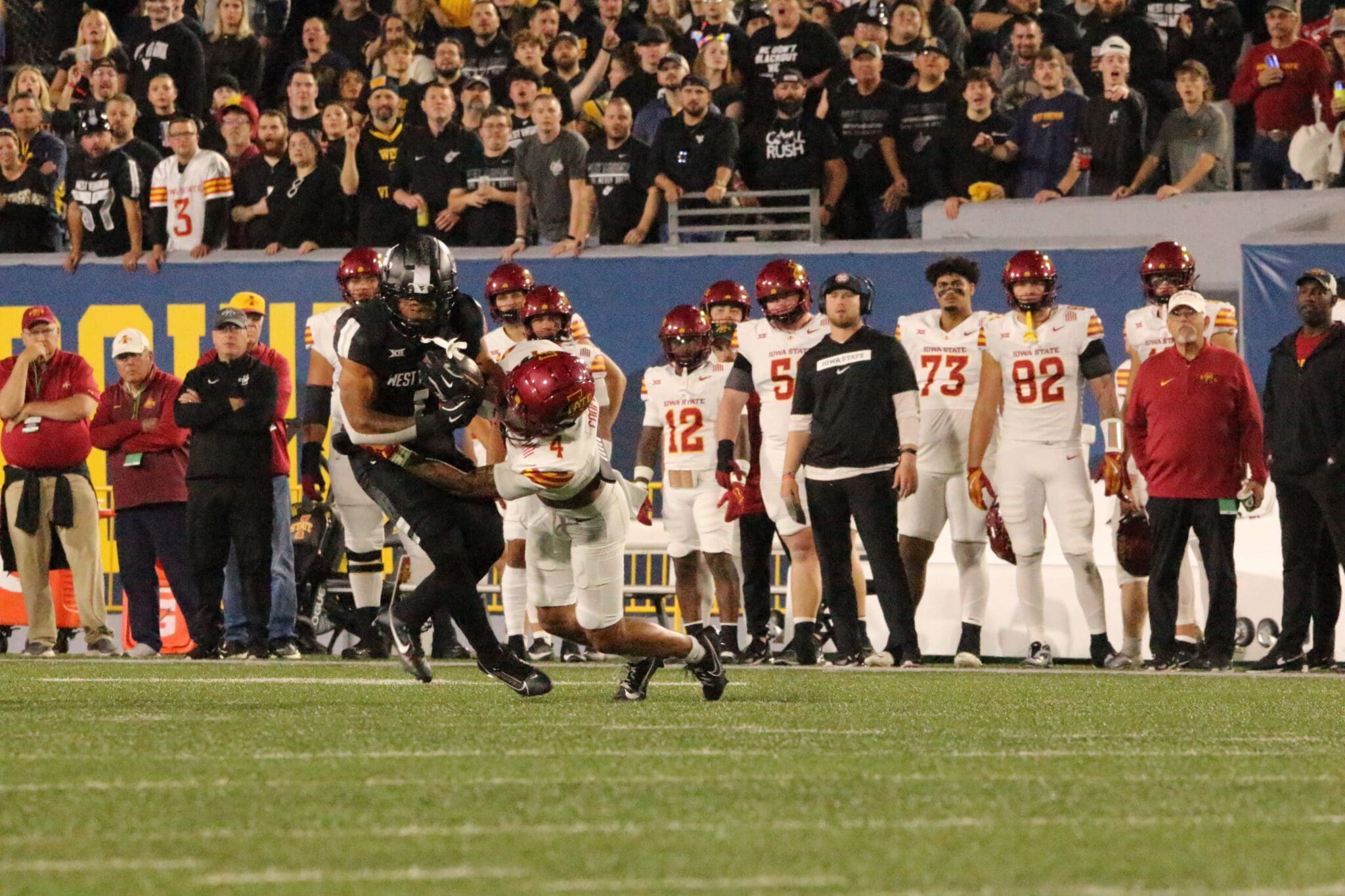 WVU Football RB Jahiem White tackled by Iowa State