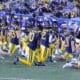WVU Football team stretching