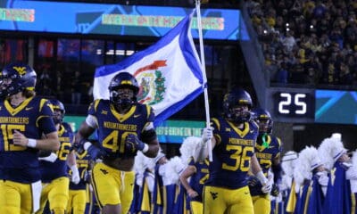 WVU Football Flag Carrier Caden Biser