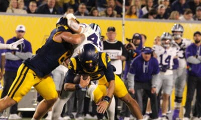 WVU Football QB Garrett Greene diving against Kansas State