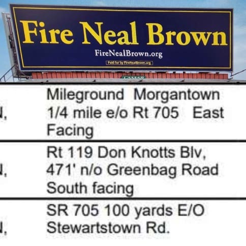 Fire Neal Brown billboard from WVU fans directions 