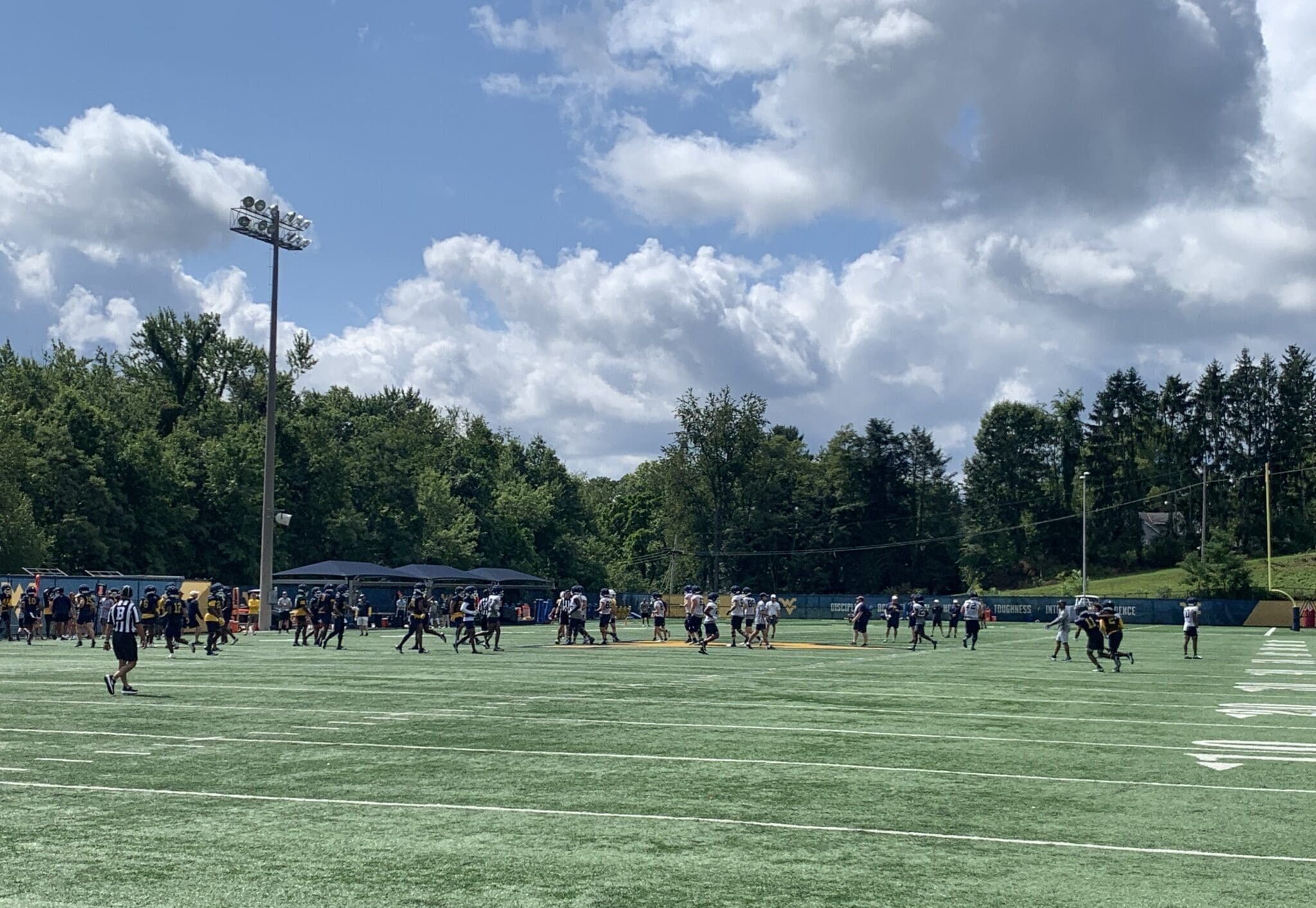 WVU Football at practice field stock