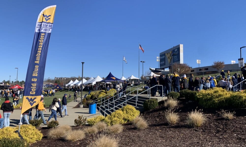 WVU Football fans outside Milan Puskar Stadium stock