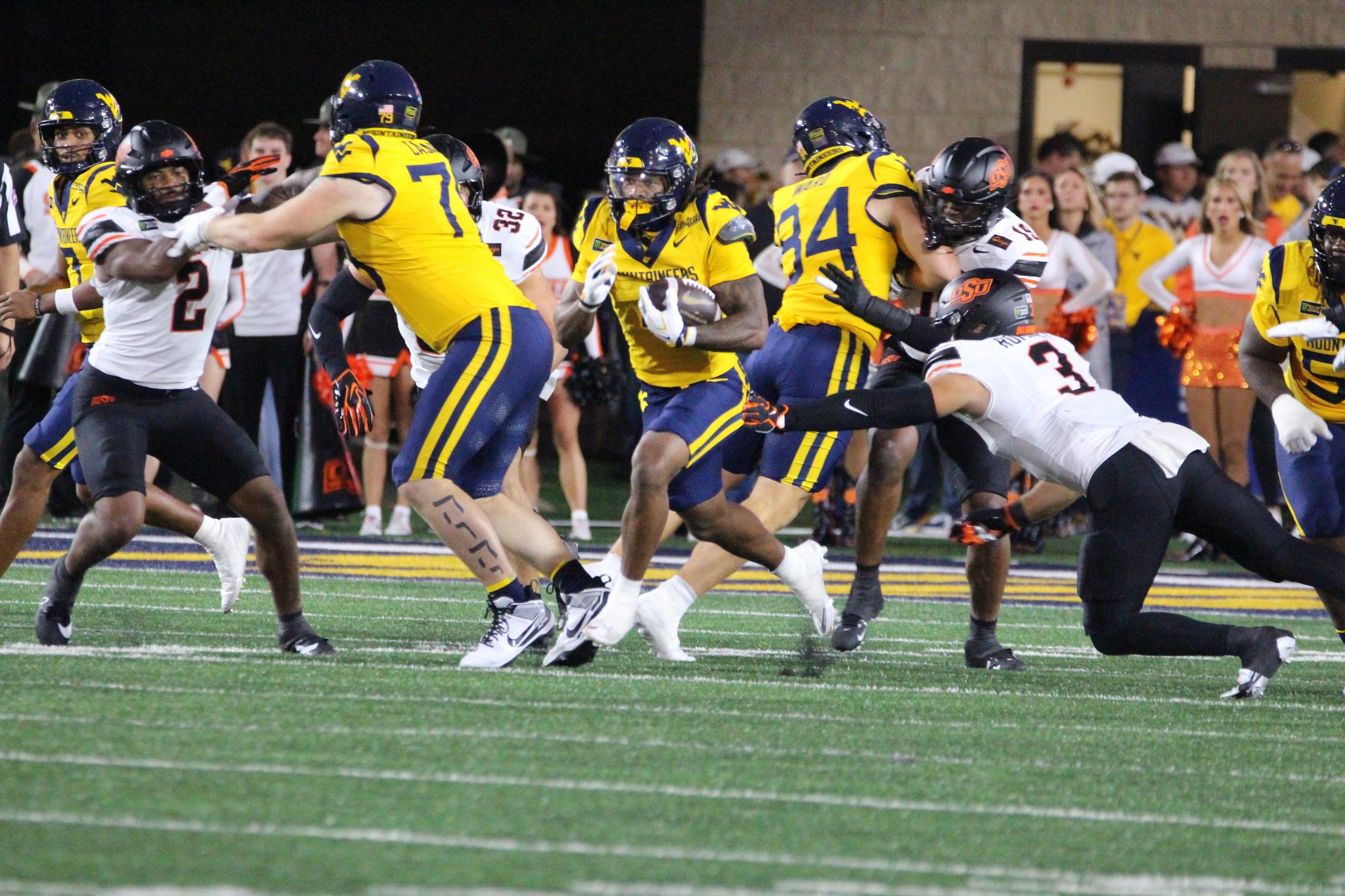 WVU Football RB Cam Cook running with TE Ryan Ward blocking