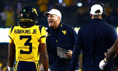 WVU Football Rich Rodriguez and Michael Hawkins
