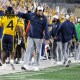 WVU Football HC Rich Rodriguez congratulates Cam Cook