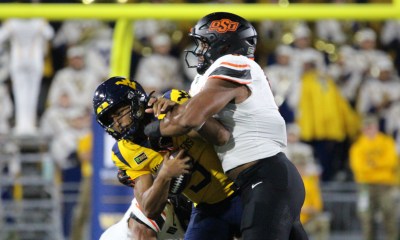 Oklahoma State defender takes down WVU Football QB Michael Hawkins