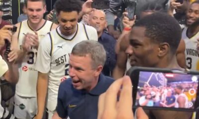WVU Basketball HC Ross Hodge celebrating with Best Virginia team