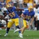 Pitt QB Eli Holstein running against WVU