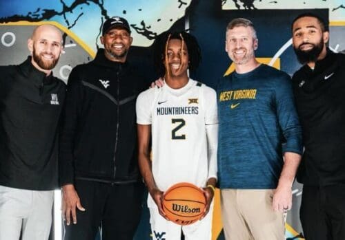 Josh Eilert and coaches recruiting Jasper Johnson
