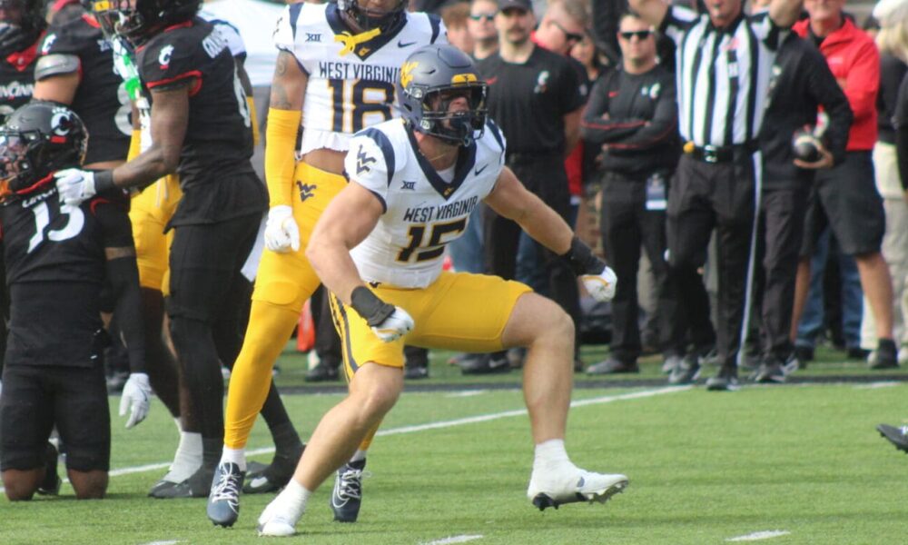 WVU Football LB Ben Cutter celebrates