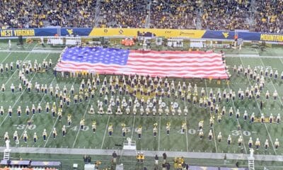 US Flag on WVU football field at Milan Puskar Stadium