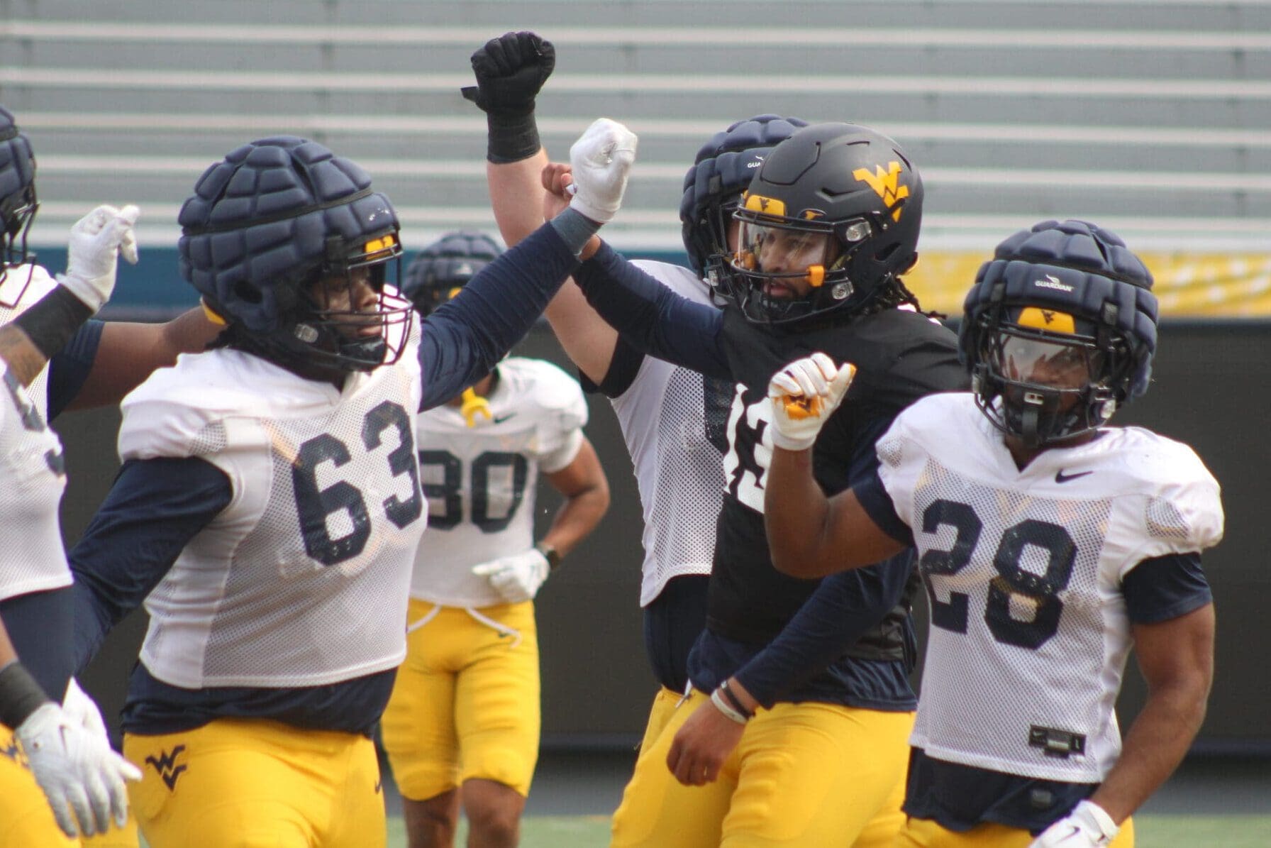 WVU Football Jaylen Henderson and LJ Turner at practice