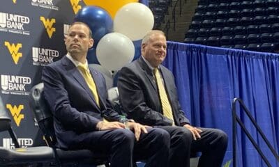 WVU Football HC Rich Rodriguez and AD Wren Baker