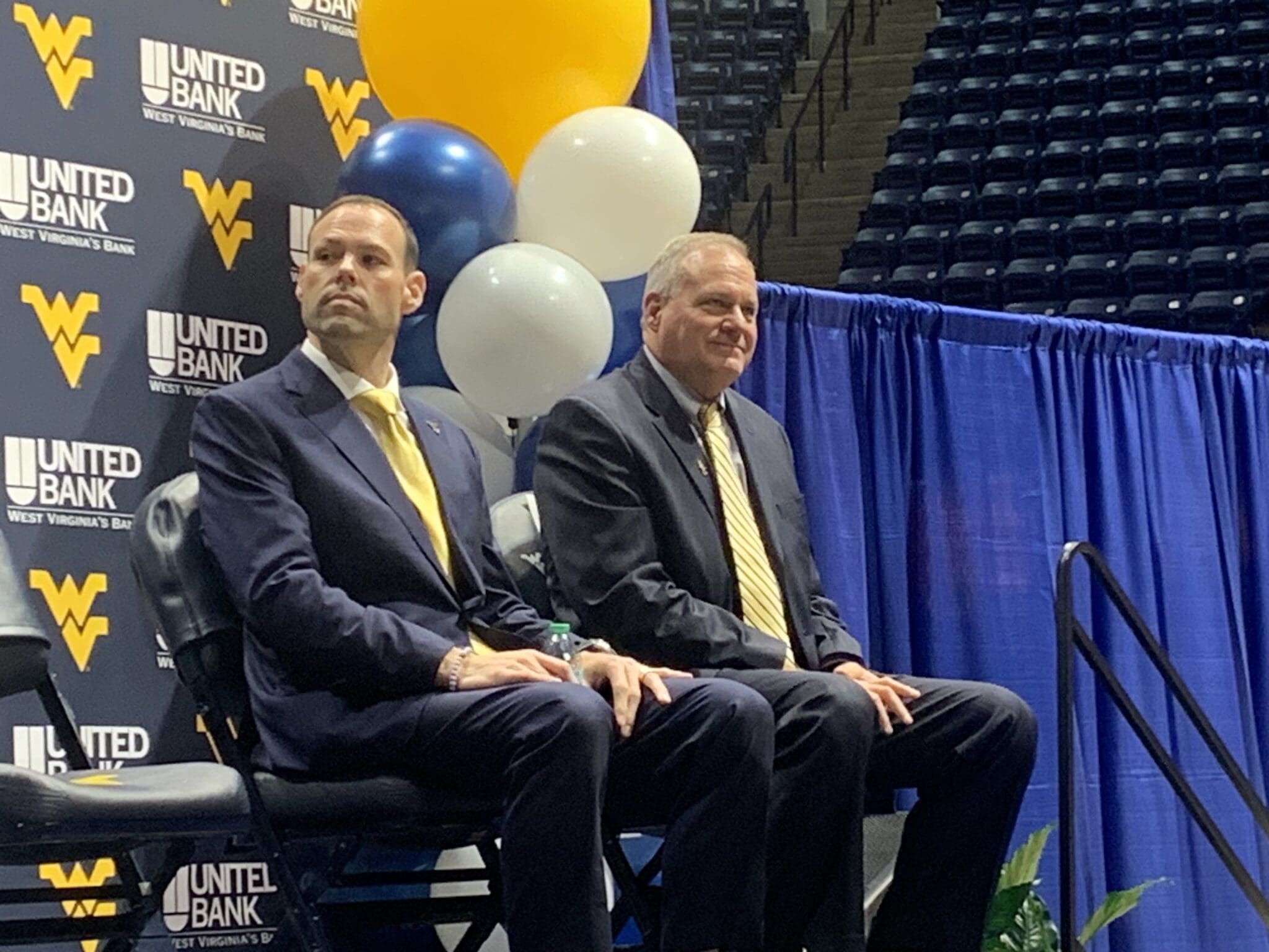 WVU Football HC Rich Rodriguez and AD Wren Baker