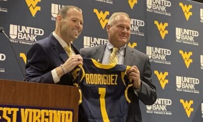 WVU Football HC Rich Rodriguez and AD Wren Baker