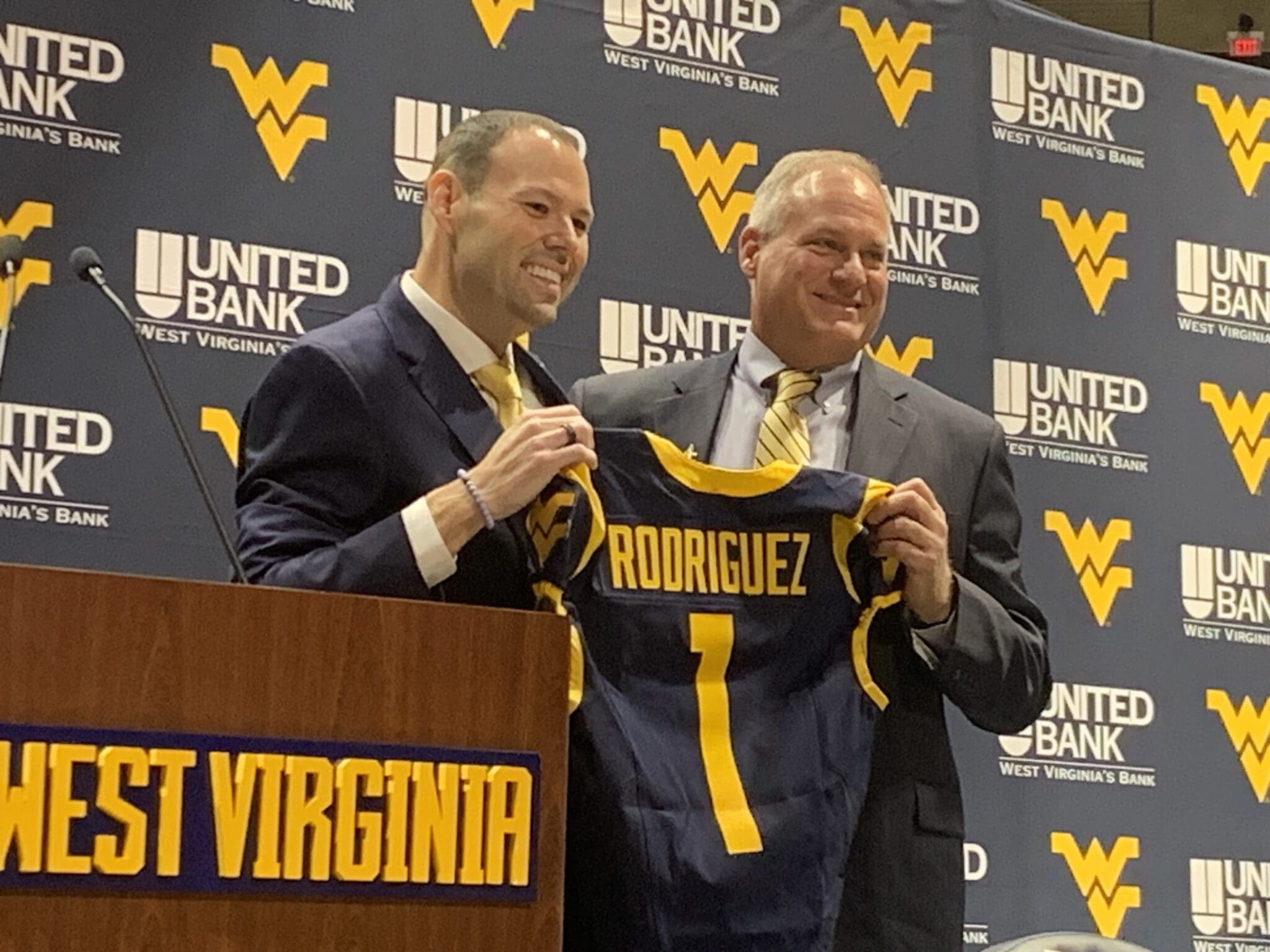 WVU Football HC Rich Rodriguez and AD Wren Baker