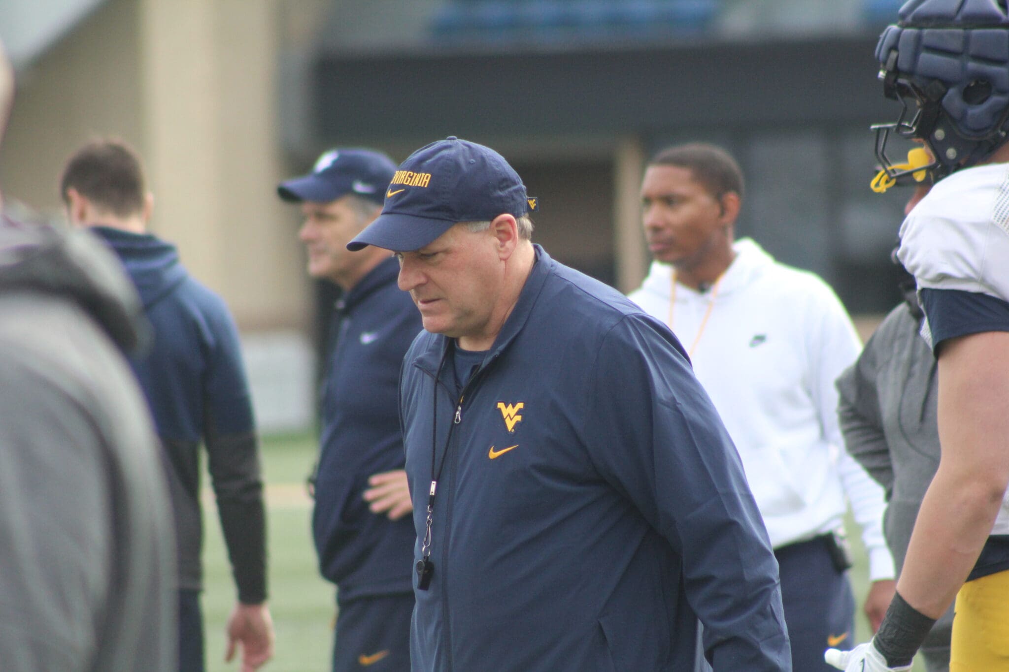 WVU Football HC Rich Rodriguez with Pat White in background