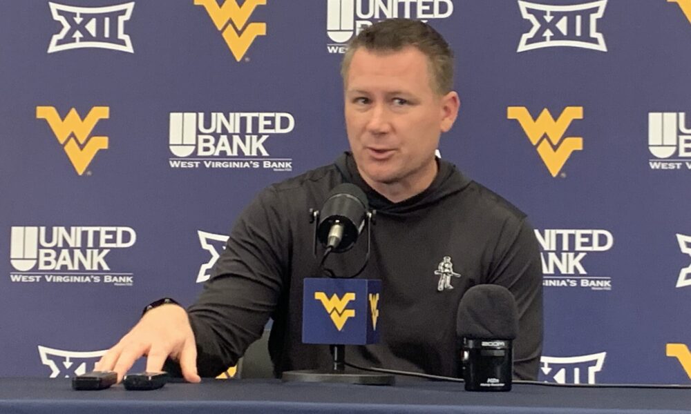 WVU senior assistant Travis Trickett