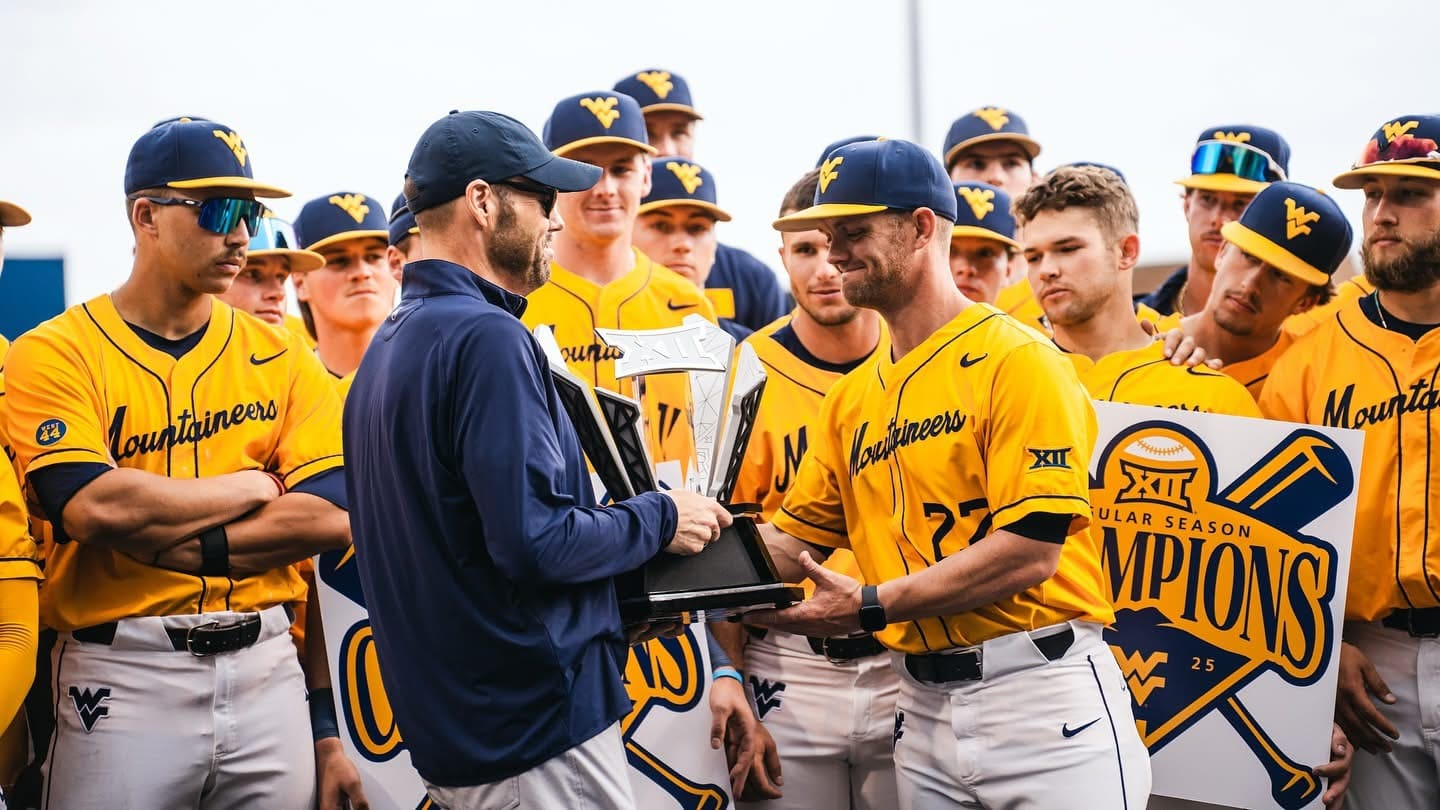 WVU Baseball Steve Sabins and players with Big 12 trophy