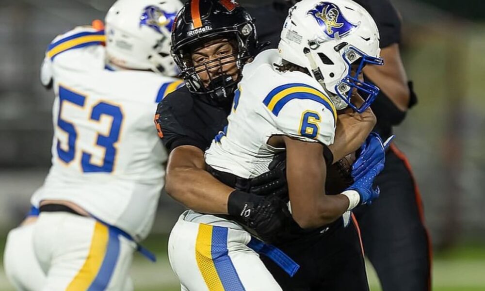 WVU Football incoming freshman linebacker Cam Torbor wraps up for a tackle. Image courtesy of Cam Torbor's Instagram account.