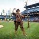 Mascot Mary Mountaineer takes the field during the Backyard Brawl at PNC Park.
