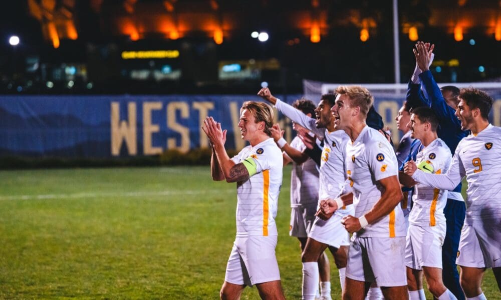 WVU Soccer celebrating