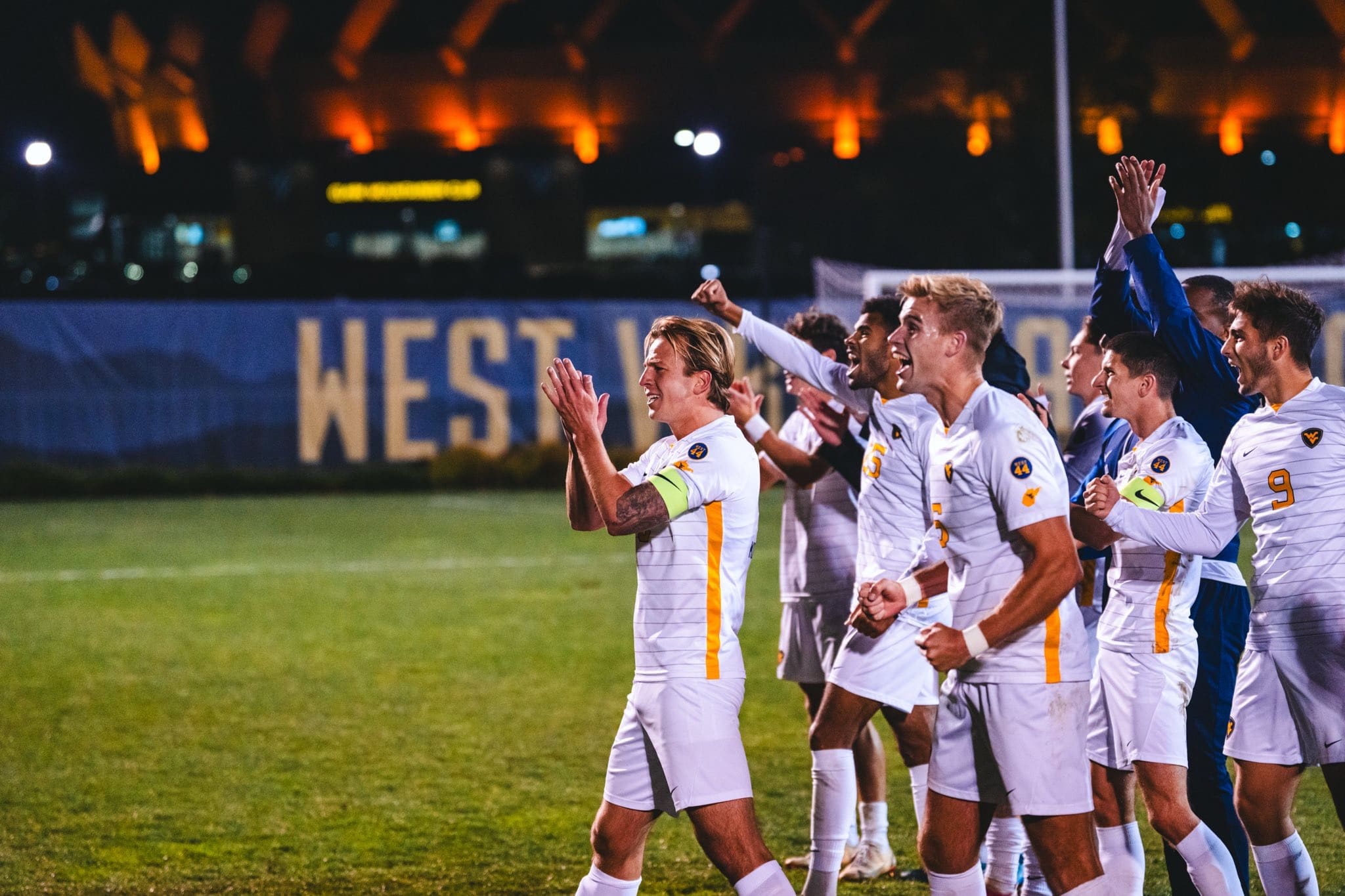 WVU Soccer celebrating