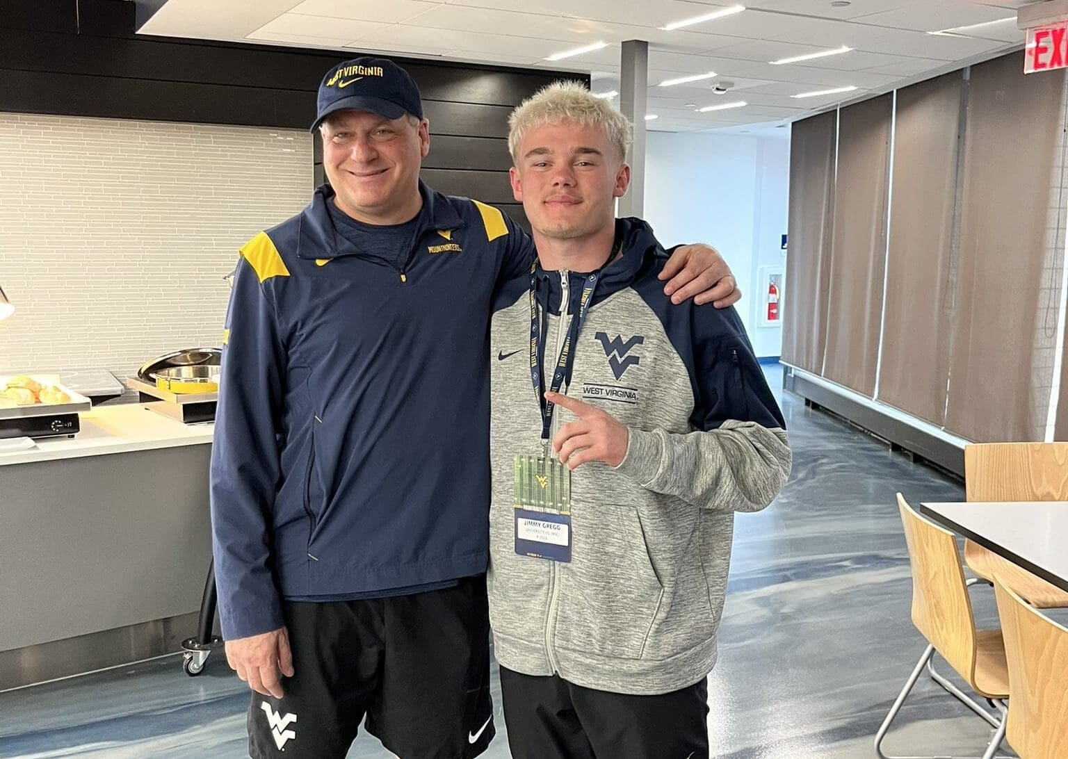 WVU Football punter recruit Jimmy Gregg and Rich Rodriguez