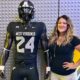 Kristin Coldsnow and WVU Coal Rush uniform