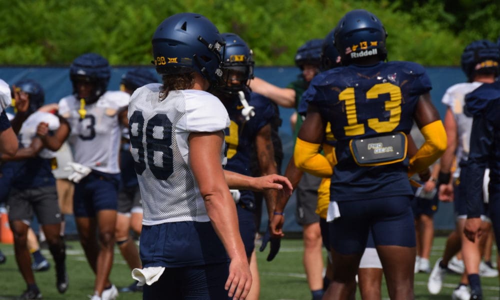 WVU holder Leighton Bechdel