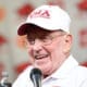 Lou Holtz with Arkansas hat on