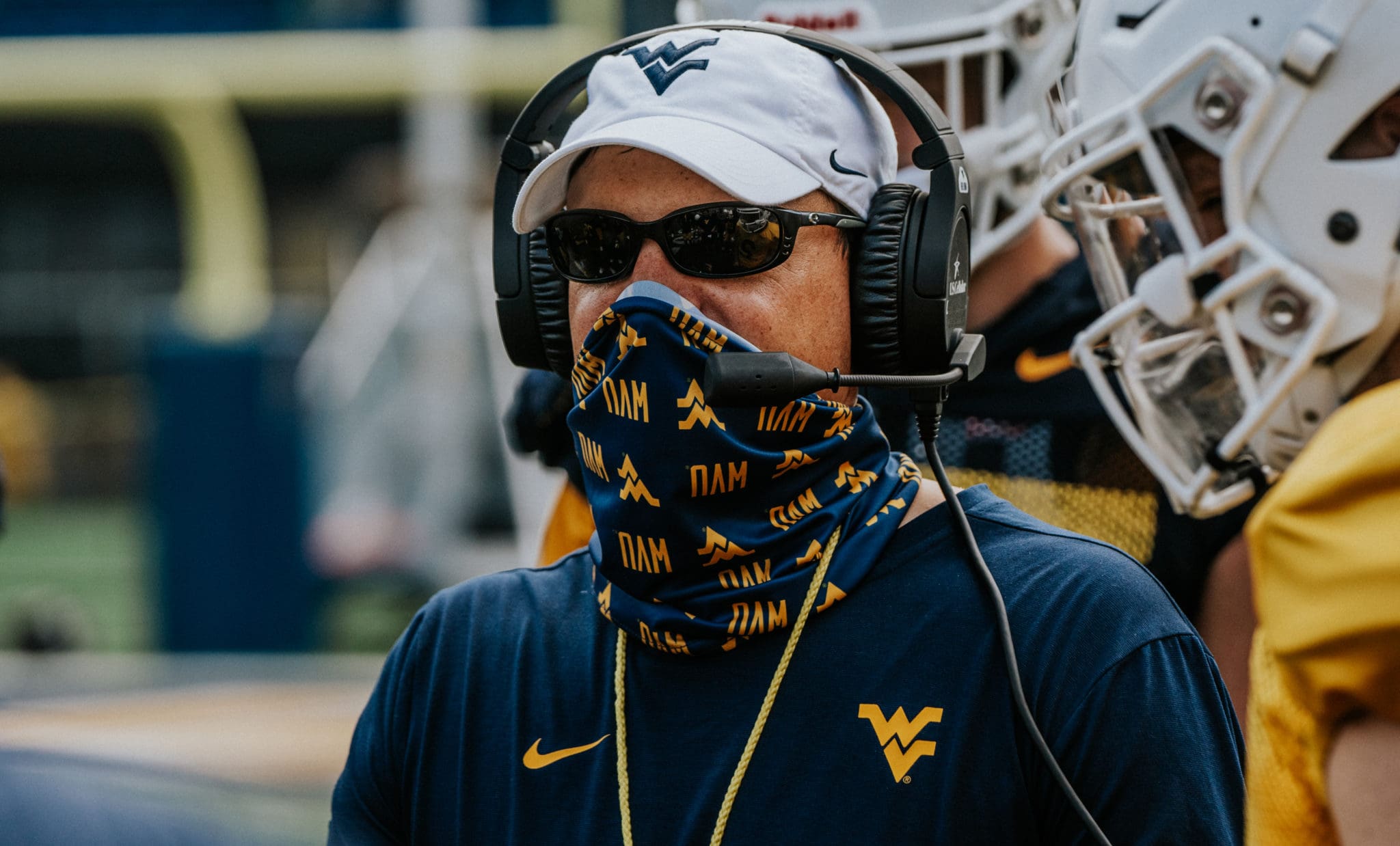 Head coach Neal Brown wearing a mask at practice
