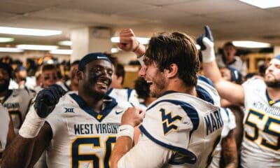 WVU Football QB Nicco Marchiol celebrating