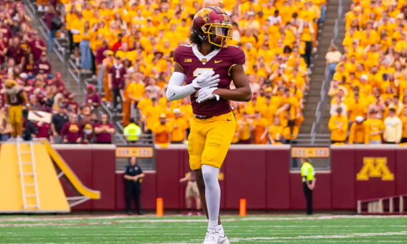 WVU DB Beanie Bishop with Minnesota.