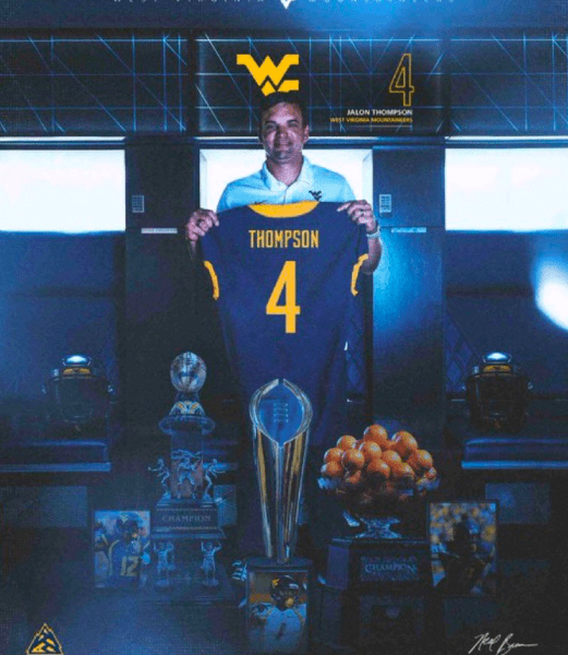 Neal Brown with WVU Football DB recruit Jalon Thompson jersey