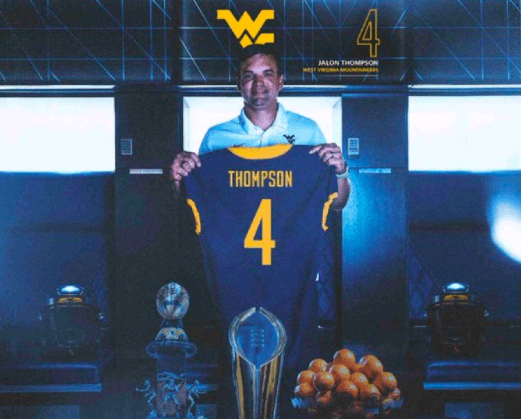 Neal Brown with WVU Football DB recruit Jalon Thompson jersey