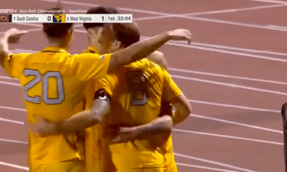 WVU men's soccer celebrates goal